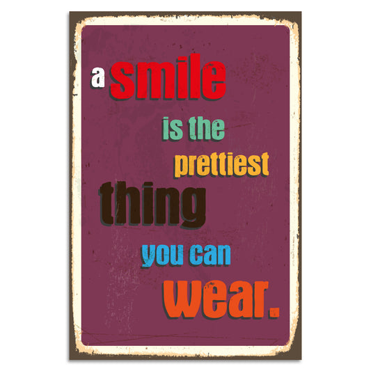 Blechschild - A Smile Is The Prettiest Thing You Can Wear.